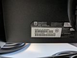 a close up of a computer with a barcode on it