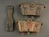 three pieces of luggage that are on a table