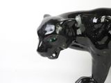 an image of a black cat statue on a white background