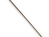 a close up of a long rope on a white surface
