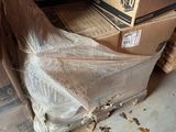 a pile of boxes that are sitting on the floor