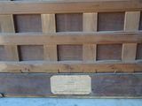 a wooden door with a sign on it