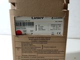 une boîte en carton sur laquelle est collée une étiquette portant l'inscription « linky »