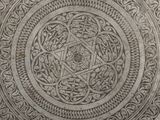 an image of a decorative plate with a star of david on it