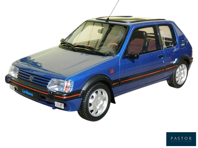 a small blue car that is parked on a white surface