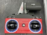 a remote control system sitting on the floor