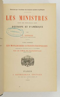 an open book with a picture of a building in the background
