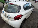 a white car that is parked in a parking lot