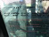 a picture of a bus window with a sign on it
