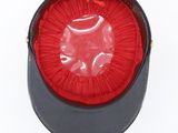 a black hat with a red lining around it