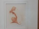 a picture of a drawing of a woman sitting on the floor