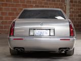 a silver car that is parked in a garage
