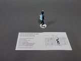 a small figurine of a man on a skateboard on a table