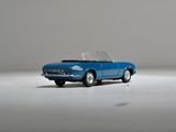 a toy car that is sitting on a white surface