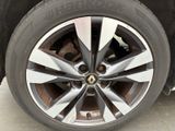 a close up view of a tire on a car