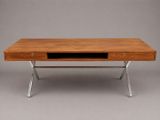 a wooden desk with metal legs and a drawer on top of it