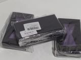 three pieces of plastic that are sitting on a table