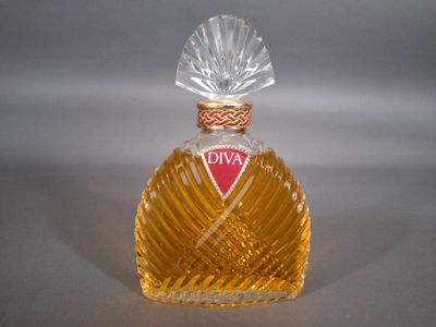 an image of a bottle of perfume on a table