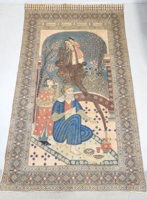 an antique persian rug with a painting of a woman and a man on a horse