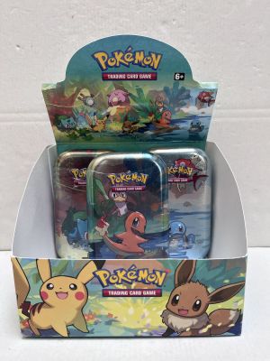 a box of pokemon trading cards with a box of them