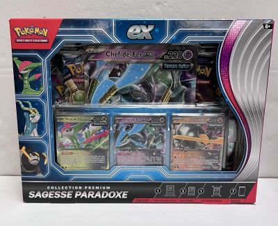 une boîte de cartes Pokémon exposée sur une table