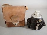 a brown bag and a brown bag with a spray can