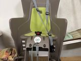 an image of a child ' s high chair with a safety belt