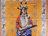 an orange and white scarf with an image of a native indian man