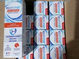 a box of toothpaste and a box of toothpaste on a table