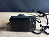 a camera that is sitting on a wooden table