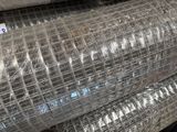 several rolls of galvaniized wire are stacked on top of each other