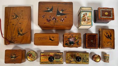 many wooden boxes with birds and flowers on them