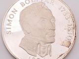 a close up of a coin with a picture of a man on it
