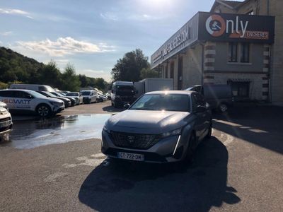 a car parked in front of a building in a parking lot