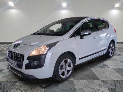a picture of a white car parked in a garage