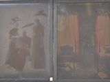 une vieille photo représentant un homme et une femme dans une pièce