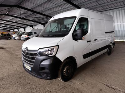 a picture of a white van parked in a garage
