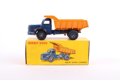 a toy truck that is sitting on top of a box