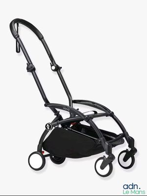 an image of a stroller with a black handlebar and wheels