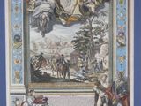 an old picture of a painting of a man on a horse in a room