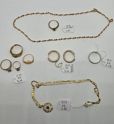 a group of gold jewellery including rings, bracelets, and rings