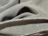a close up of a piece of cloth with a hole in it