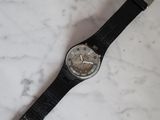 an image of a wrist watch sitting on a marble surface