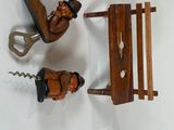 two miniature figurines of a man and a woman on a bench