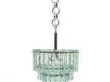an image of a glass chandelier hanging from a ceiling