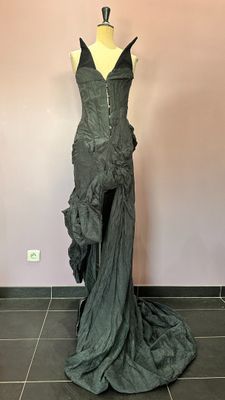 the back of a dress on a mannequin mannequin mannequin mannequin mannequin mannequin mannequin mannequin mann