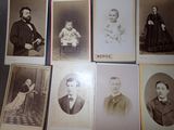 several old black and white photographs of people and a baby