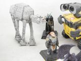 some toys that are sitting on a white surface