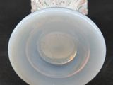 an image of a close up of a glass vase on a table