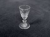 a glass that is sitting on a table